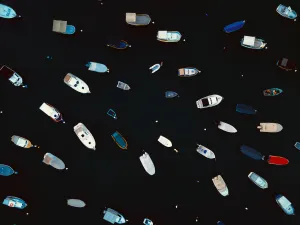 Aerial top view pattern of anchored boats at the harbour., 2020