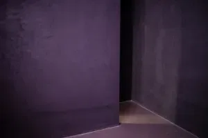Light and shadow in the corner of gray interior concrete building, 2021