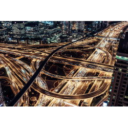 Aerial View of Dubai City Traffic and Road Intersection at Night