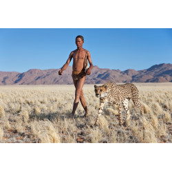 Indigenous Bushman/San hunter with cheetah.
